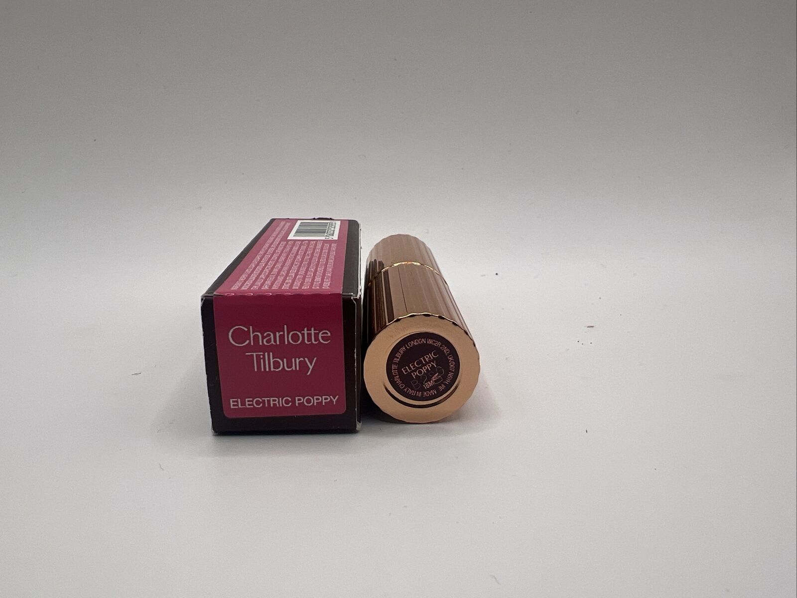 Charlotte Tilbury~Matte Revolution Luminous Modern Lipstick ~ Electric Poppy 