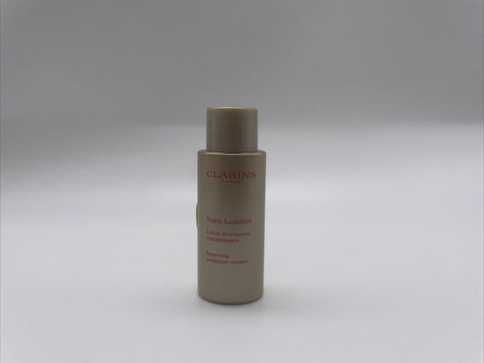 CLARINS Nutri-Lumiere Renewing Treatment Essence Toning Lotion Soften .3oz 10ml 