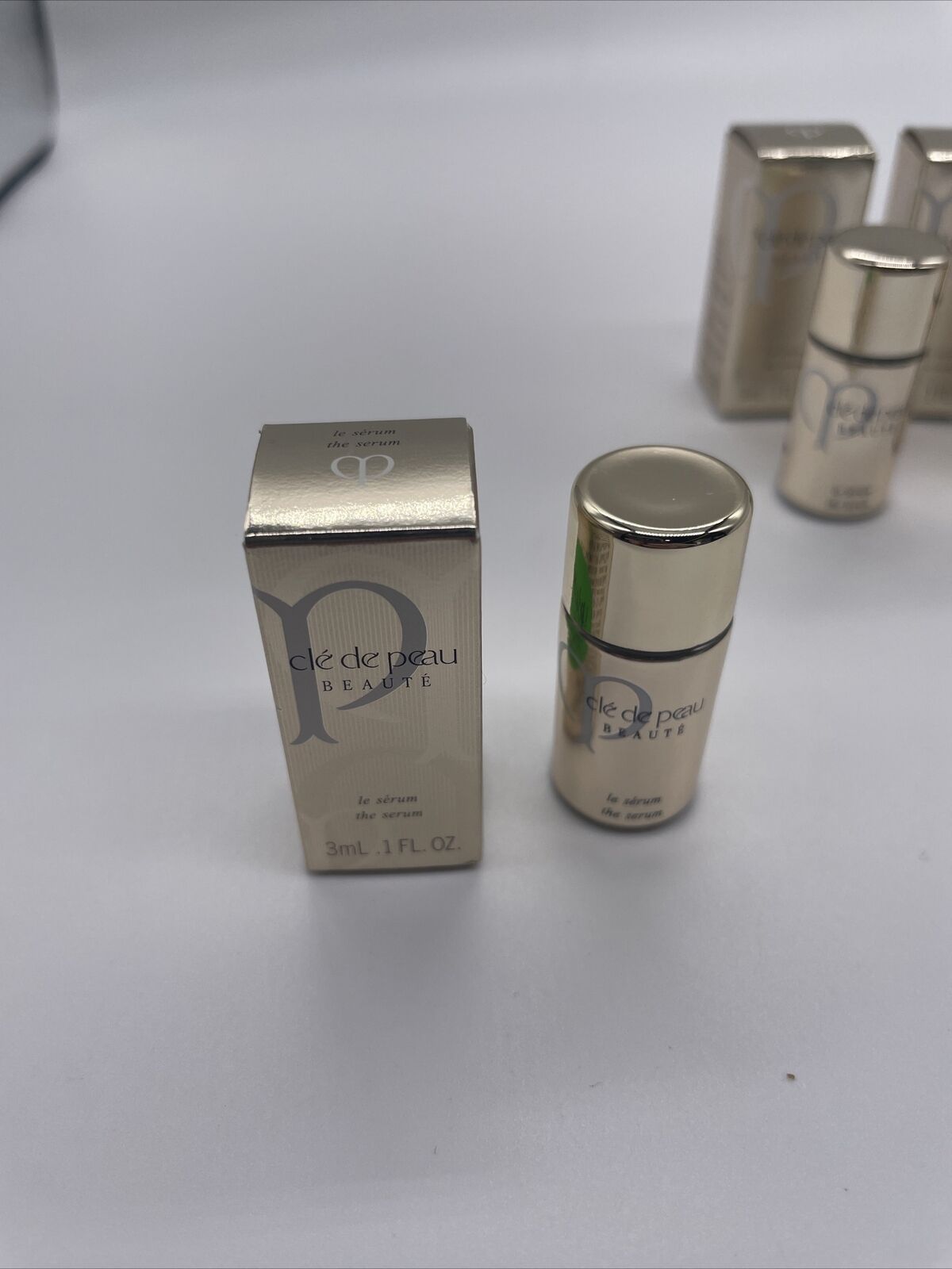 Lot 3 NIB cle de peau beaute the serum le serum .1oz 3ml = 9 Ml travel size