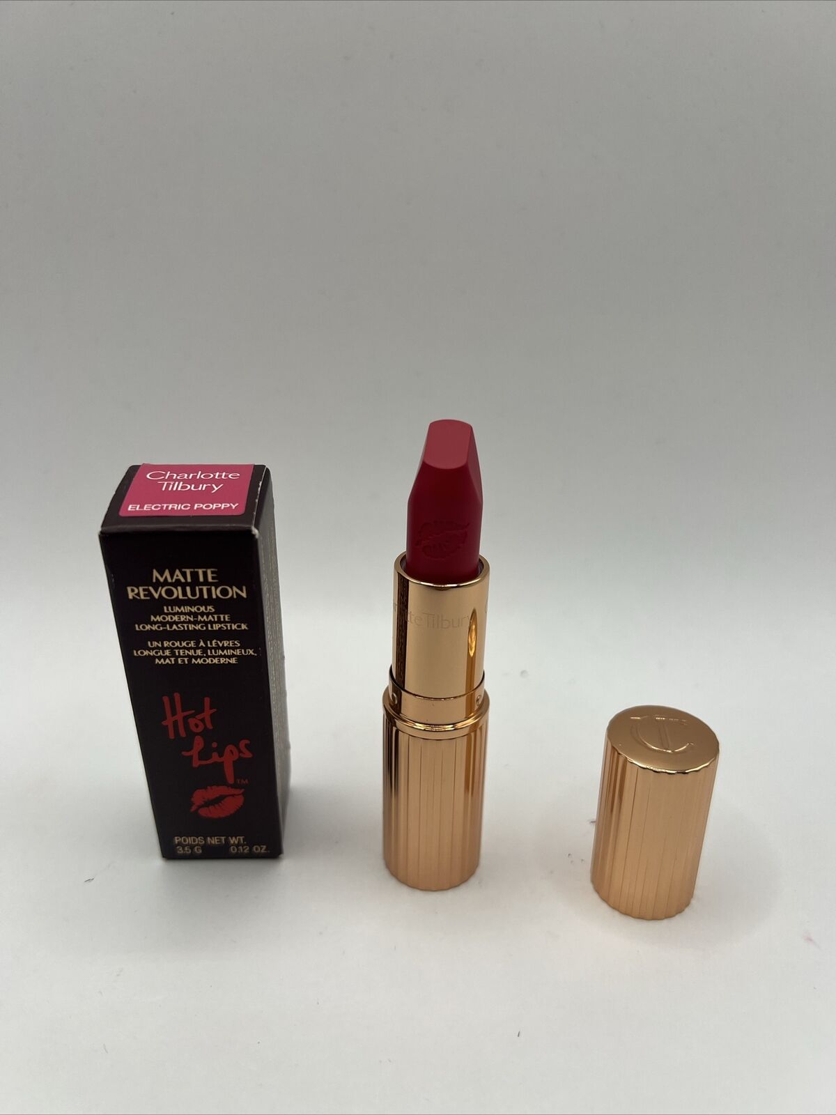 Charlotte Tilbury~Matte Revolution Luminous Modern Lipstick ~ Electric Poppy 