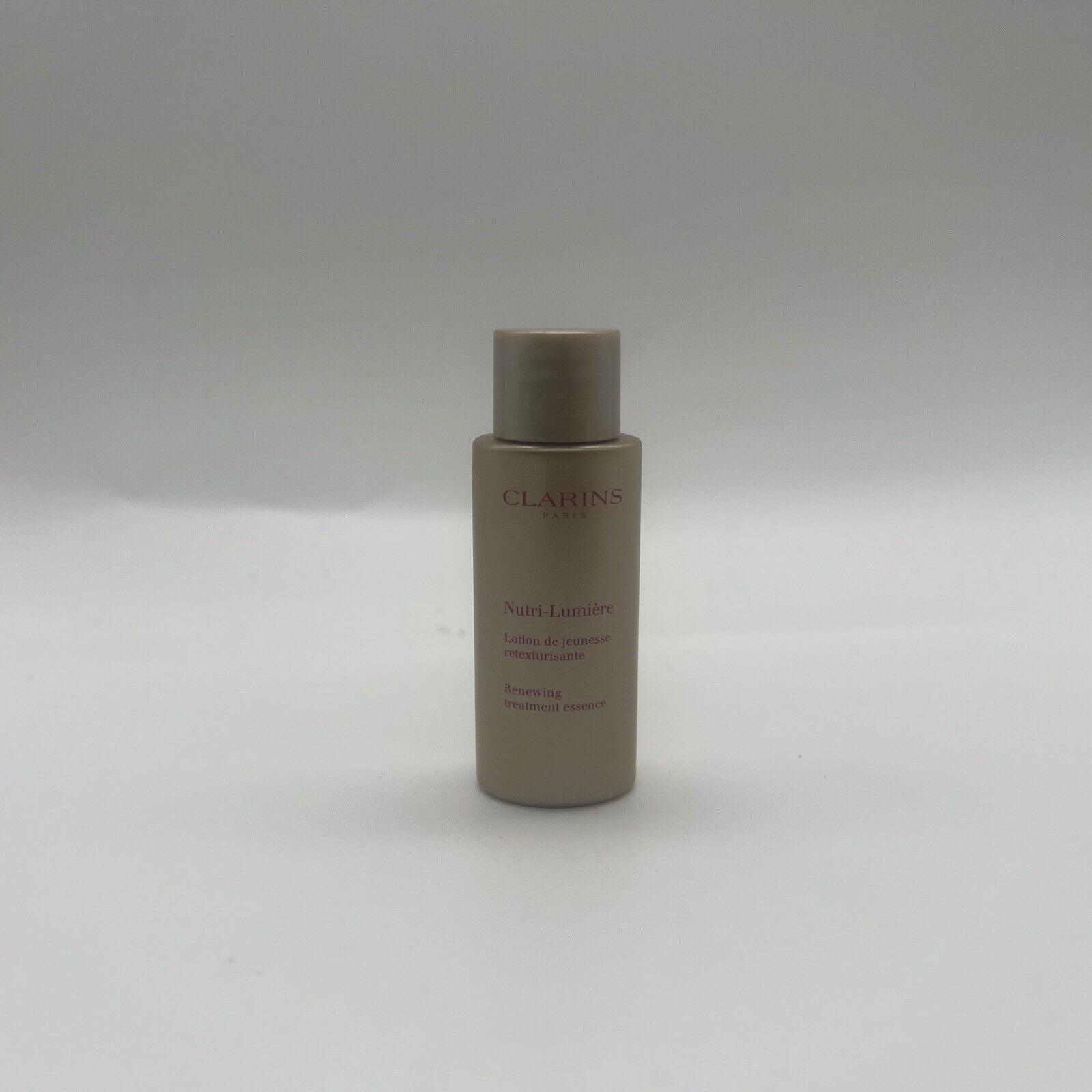 CLARINS Nutri-Lumiere Renewing Treatment Essence Toning Lotion Soften .3oz 10ml 