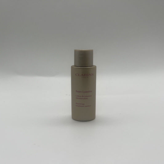 CLARINS Nutri-Lumiere Renewing Treatment Essence Toning Lotion Soften .3oz 10ml 